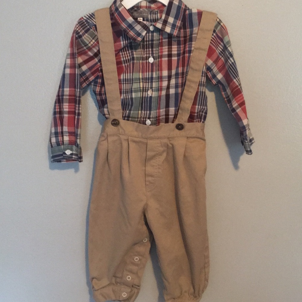 Overalls and long sleeved plaid shirt